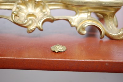 Lot 3 - A Rococo Revival gilt brass mantel clock, the...
