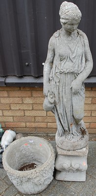 Lot 1420 - A reconstituted stone garden statue of the...