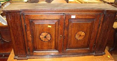 Lot 1275 - An antique oak and inlaid double door table...