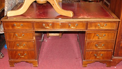 Lot 1331 - A mahogany and gilt tooled red leather inset...