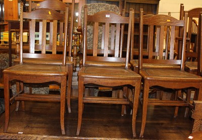 Lot 1345 - A set of eight early 20th century oak bar and...