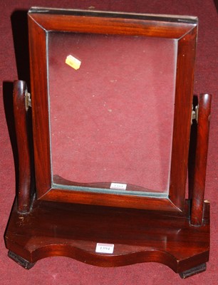 Lot 1394 - A small Victorian mahogany swing dressing mirror
