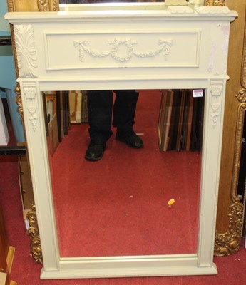 Lot 1074 - An Adam style green painted wall mirror, the...