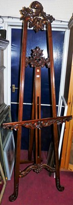 Lot 1135 - A reproduction carved hardwood artists easel,...