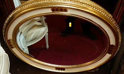 Lot 1132 - A modern gilt framed and bevelled oval wall...