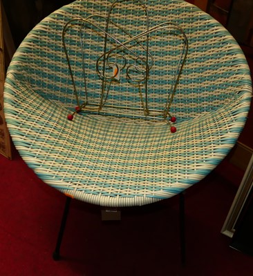 Lot 1133 - A 1950s wicker basket chair on an iron base,...