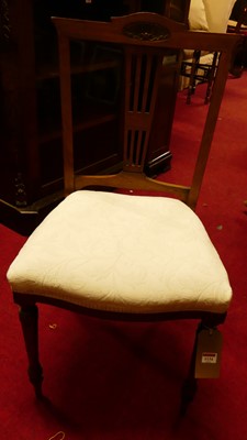 Lot 1134 - A pair of Edwardian walnut salon chairs, with...