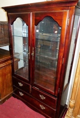 Lot 1149 - A reproduction cherry wood china display...