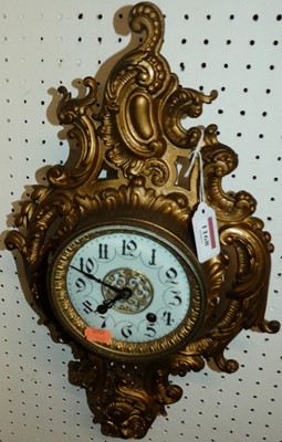 Lot 1168 - A circa 1900 Rococo Revival gilt metal cartel...