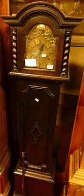 Lot 1231 - A Jacobean style oak grandmother clock, having...