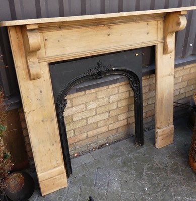 Lot 1176 - A pine fire surround with serpentine top,...