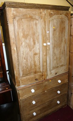 Lot 1189 - A Victorian pine linen cupboard, having twin...