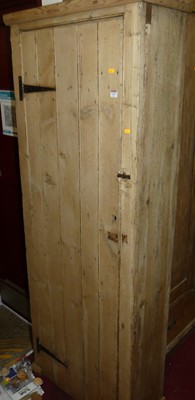 Lot 1197 - A rustic pine single door pantry cupboard,...