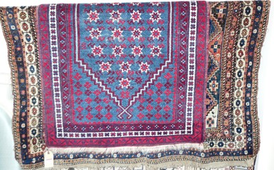 Lot 1202 - A Persian woollen blue ground Shiraz rug, 150...