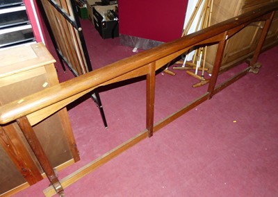 Lot 1217 - An ecclesiastical hardwood  long altar rail,...