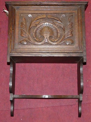 Lot 1239 - An early 20th century relief carved oak single...