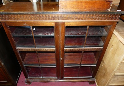 Lot 1242 - An early 20th century mahogany double door...