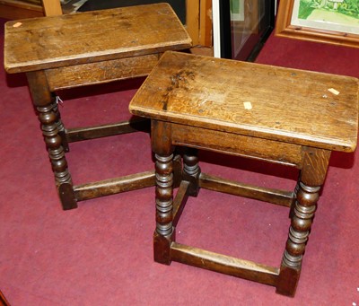 Lot 1255 - A near-pair of joined oak joint stools, each...