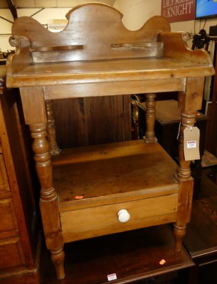 Lot 1260 - A Victorian stained pine three-quarter gallery...