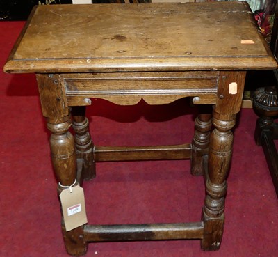 Lot 1268 - A 19th century joined oak joint stool, raised...