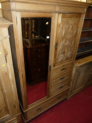 Lot 1274 - A late Victorian limed oak compactum wardrobe,...