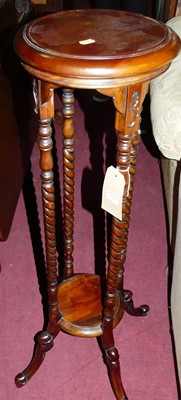 Lot 1322 - A contemporary circular hardwood two-tier...