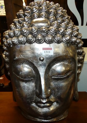 Lot 1311 - A contemporary silvered ceramic model head of...