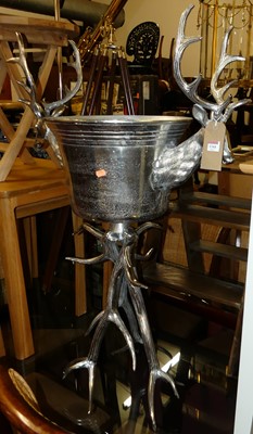 Lot 1344 - A large polished chromed metal freestanding...