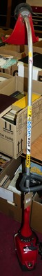Lot 1386 - A Stark 25TR petrol driven garden strimmer