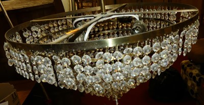 Lot 1389 - A pair of gilt metal and cut glass drop...