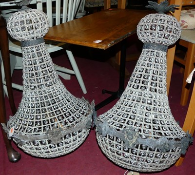 Lot 1403 - A pair of contemporary cast, ropetwist metal...