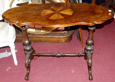 Lot 1447 - A mid-Victorian figured walnut shaped top hall...