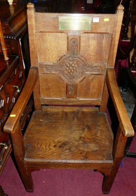 Lot 1451 - An early 20th century oak panelled back and...