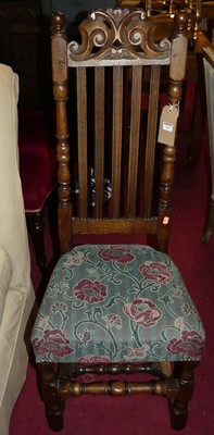 Lot 1460 - An antique joined oak slatback single dining...