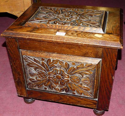 Lot 1475 - An early 20th century floral low relief carved...