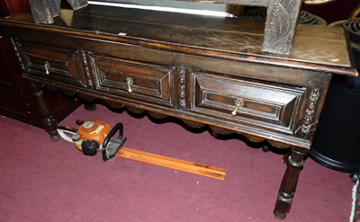 Lot 1484 - A joined and geometric moulded oak three...