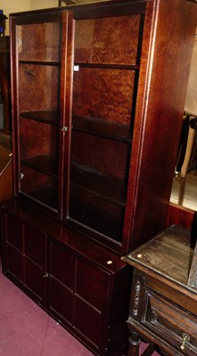 Lot 1486 - A contemporary hardwood display cabinet,...