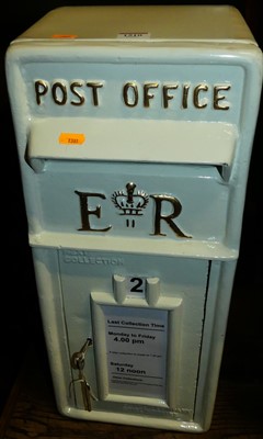 Lot 1510 - A re-painted cast iron postbox, 57.5 x 24cm
