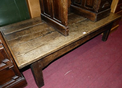 Lot 1511 - A rustic planked oak low rectangular coffee...