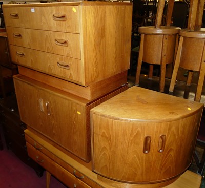 Lot 1518 - A pair of 1970s G-Plan teak low three drawer...