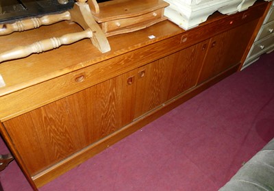 Lot 1335 - A 1970s Danish teak and teak veneered long...