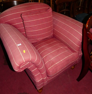 Lot 1278 - A contemporary red upholstered scroll armchair,...