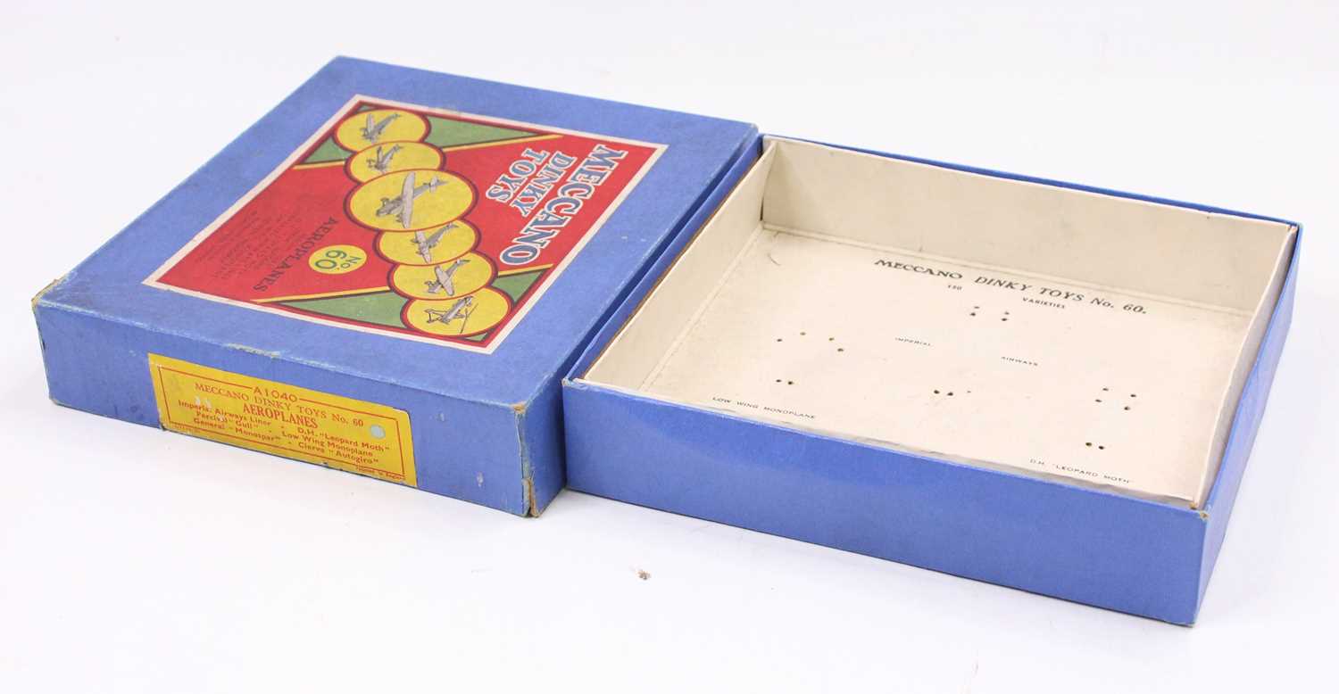 Lot 1089 - Dinky Toys pre-war No. 60 Aeroplanes empty...