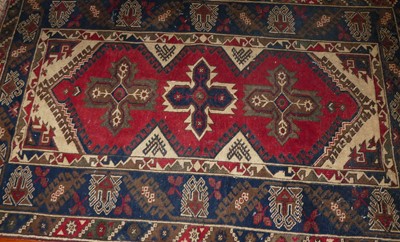 Lot 1338 - A Persian woollen red and blue ground Shiraz...