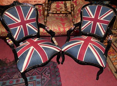 Lot 1409 - A pair of contemporary French style black...