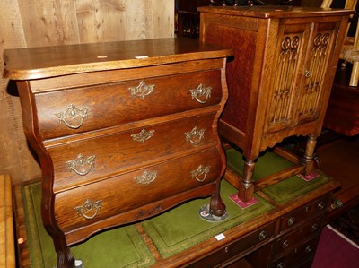 Lot 1443 - A small Dutch oak three-drawer bombe chest,...