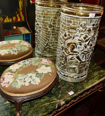 Lot 1482 - A Dutch embossed brass circular stickstand,...