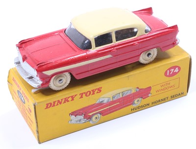 Lot 1084 - Dinky Toys, 174 Hudson Hornet Sedan, red lower...