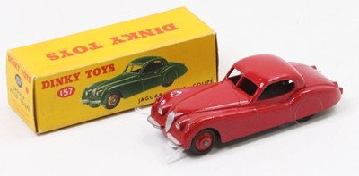 Lot 1102 - A Dinky Toys No. 157 Jaguar XK 120 coupe...