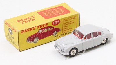 Lot 1105 - A Dinky Toys No.195 Jaguar 3.4 litre saloon,...